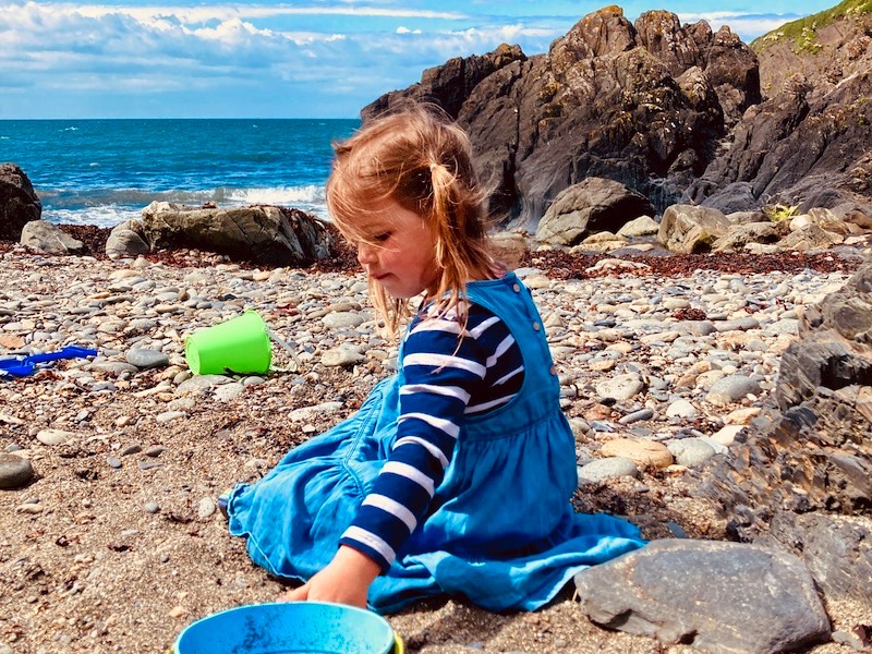 Playing in the sand, Aberfelin Beach, Pembrokeshire Coast.