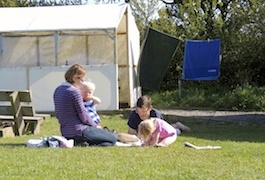 Family of glamping holidaymakers in Pembrokeshire